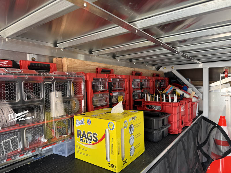 precision-signs-truck-tour-6 Left-side storage inside the Precision Signs truck box