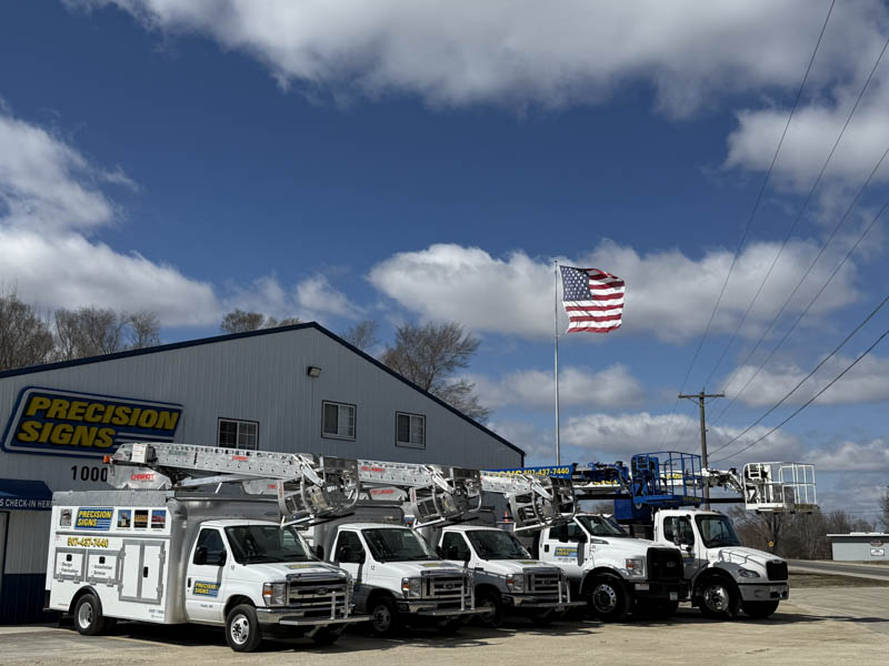 precision-signs-truck-tour-building Precision Signs bucket truck introduction image